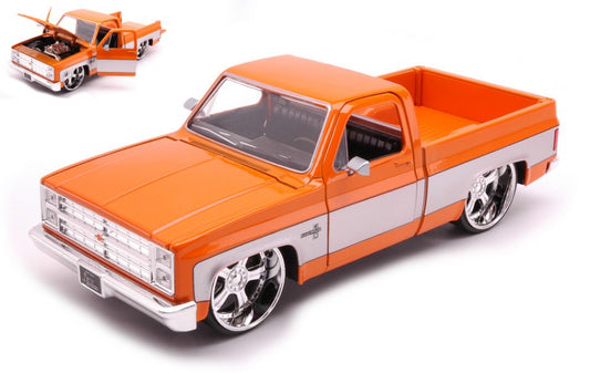 CHEVROLET C-10 PICK UP 1985 ORANGE/GREY 1:24 - Jada Toys - JADA33612