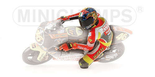 PILOTA RIDING VALENTINO ROSSI IN POSIZIONE DI 'PIEGA' WORLD CHAMPION 1999 - 1/12 - Minichamps