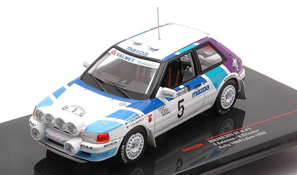 MAZDA 323 GTX N.5 1000 LAKES RALLY 1990 W/NIGHT LIGHTS SALON./SILAN.1:43