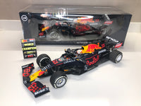 Red Bull RB16B (2021) 1:18 - ماكس فيرستابين الفائز بسباق الجائزة الكبرى أبو ظبي بطل العالم مع لوحات الحفرة 2021 - Minichamps 